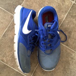 Men’s blue and white Nike sneakers